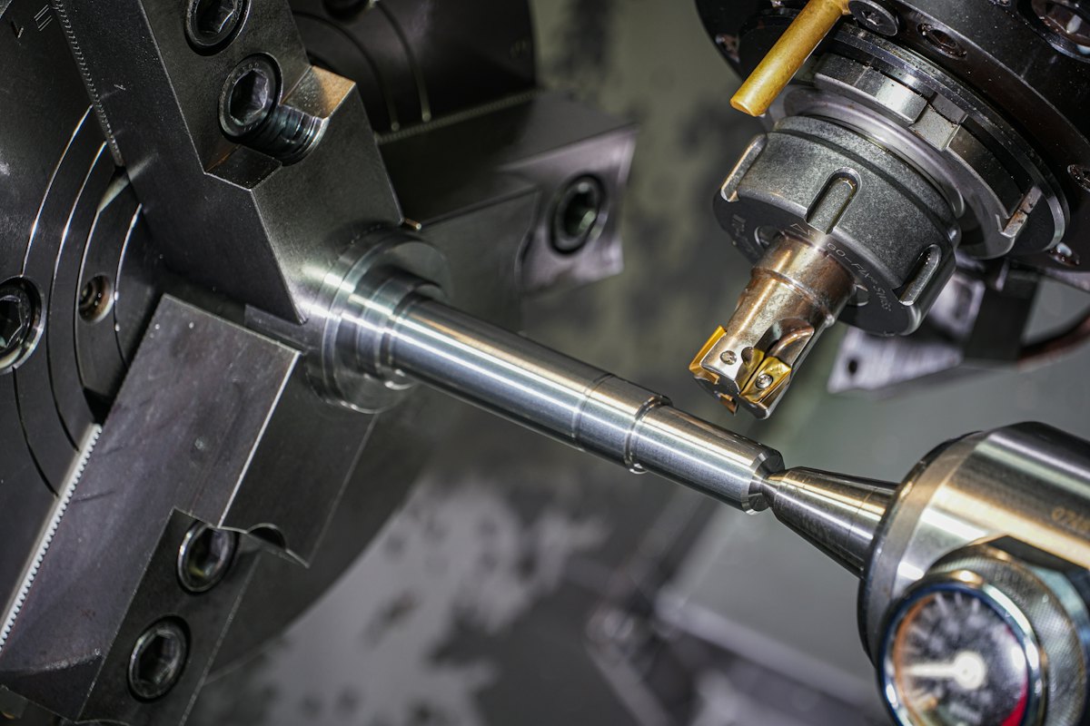 Close-up of a lathe machining a shaft